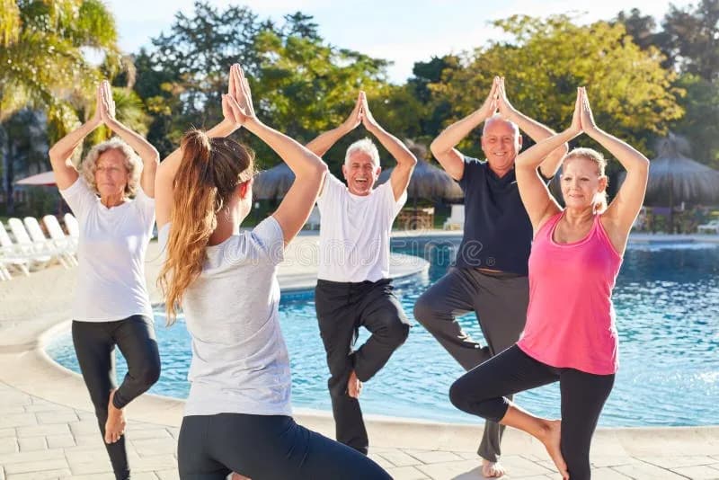 Group of seniors participating in a yoga class