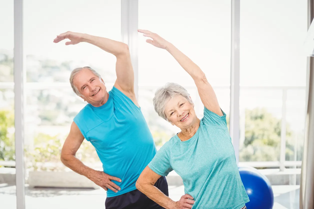 Senior couple doing physical therapy exercises